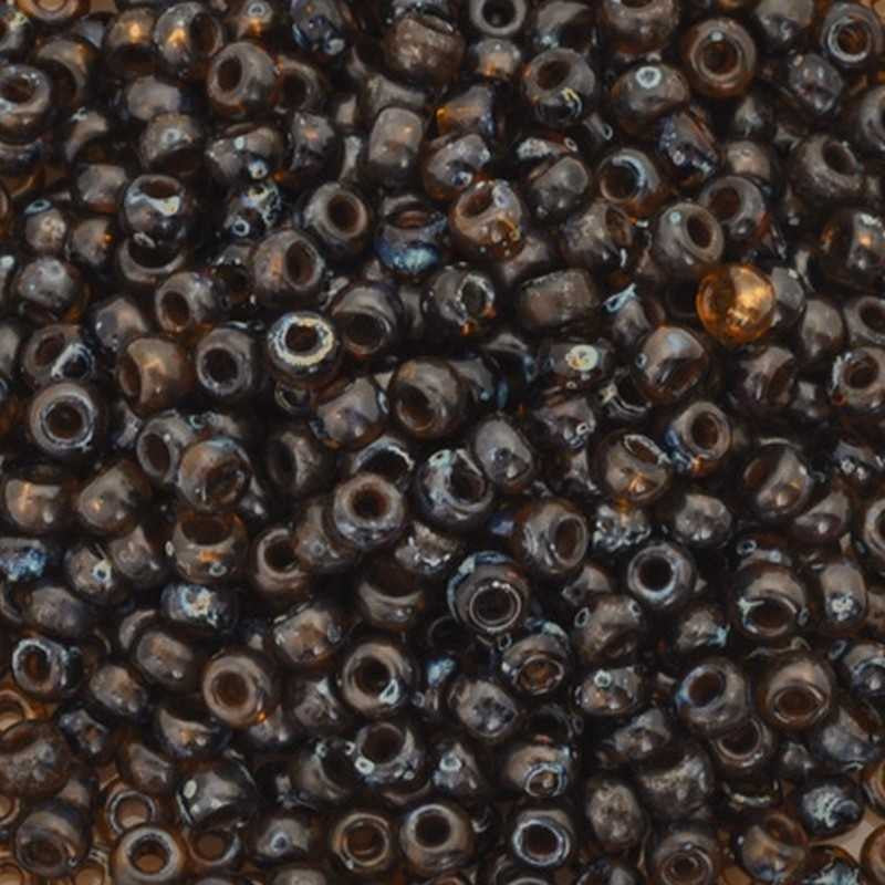 Seed Beads-6/0 Round-4502 Transparent Dark Topaz Picasso-Miyuki-16 Grams