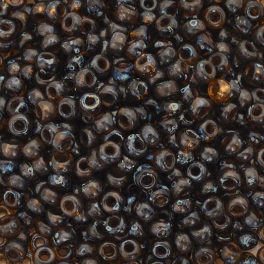 Seed Beads-8/0 Round-4502 Transparent Dark Topaz Picasso-Miyuki-16 Grams